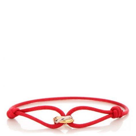 cartier trinity bracelet red ribbon